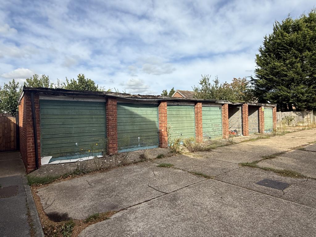 Lot: 4 - COMPOUND OF TWENTY GARAGES AND LAND IN NEED OF REFURBISHMENT TOGETHER WITH AN AREA OF AMENITY LAND - Second compound of garages in village